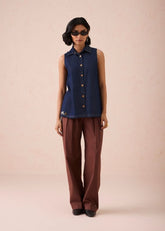 A Model Wearing Blue Denim The Mountain Denim Sleevless Shirt, curated by Only Ethikal